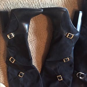 Black boots never worn.